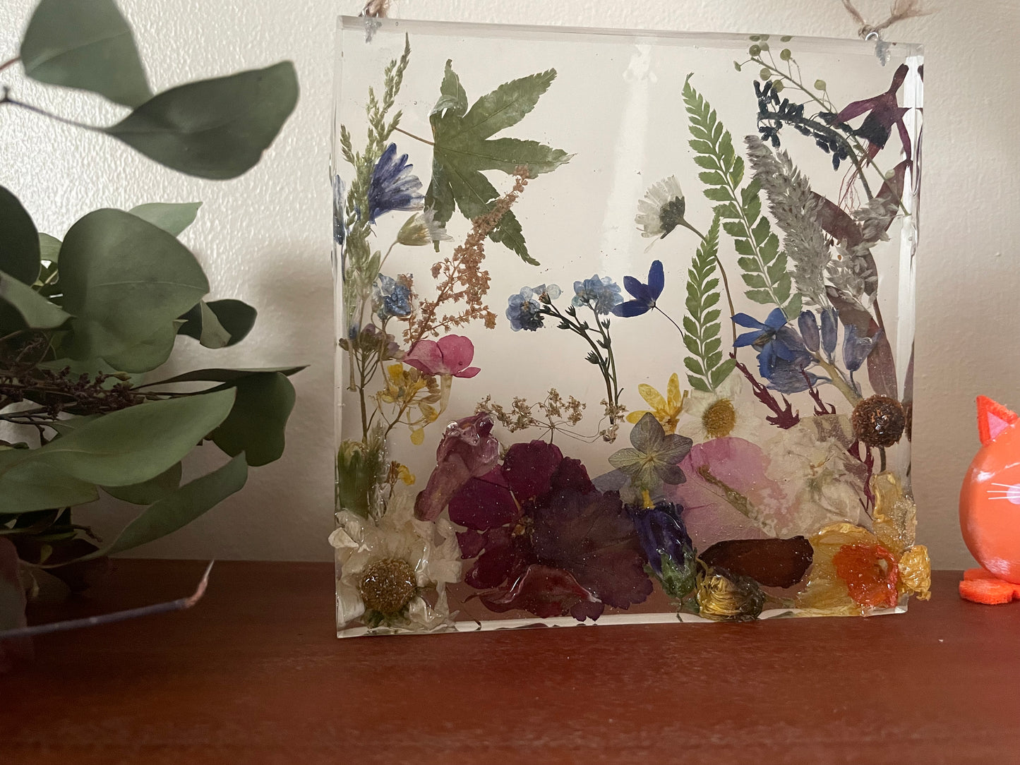 Dried flowers in resin wall art