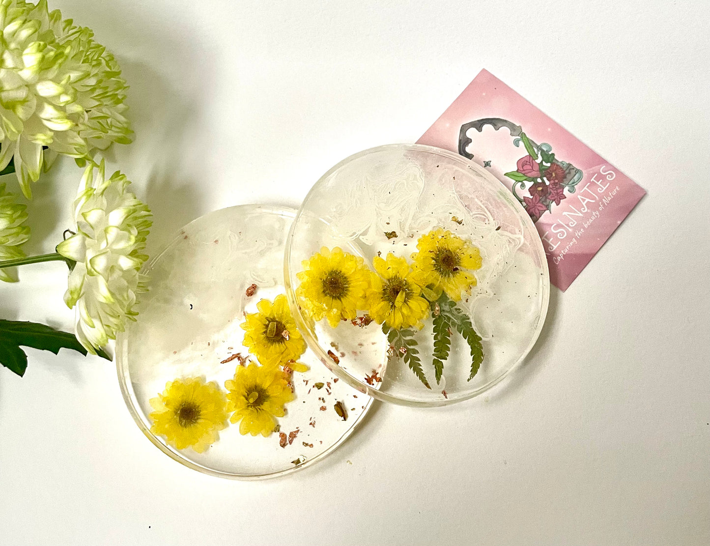 Dried yellow flower and resin coasters