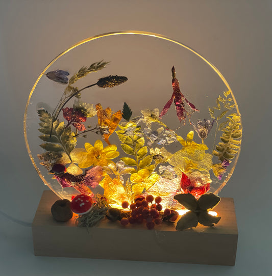 Wildflower and resin ornament with LED light up base