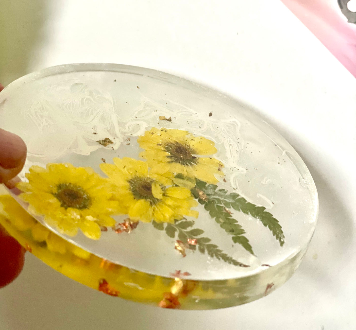 Dried yellow flower and resin coasters