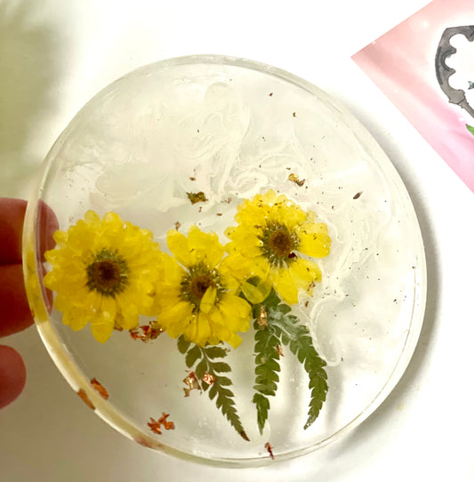 Dried yellow flower and resin coasters