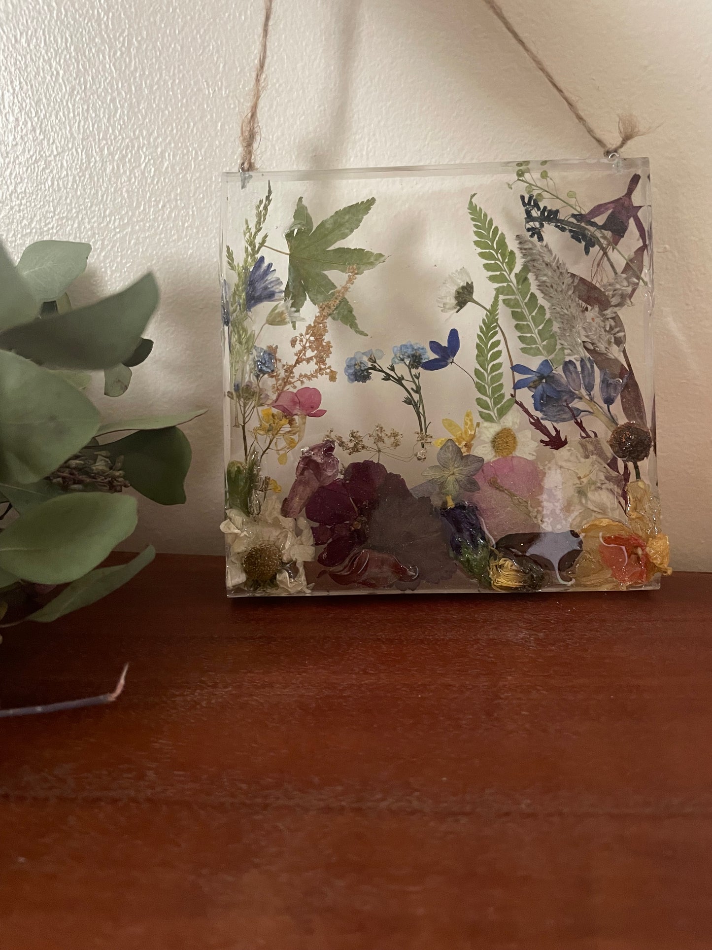 Dried flowers in resin wall art