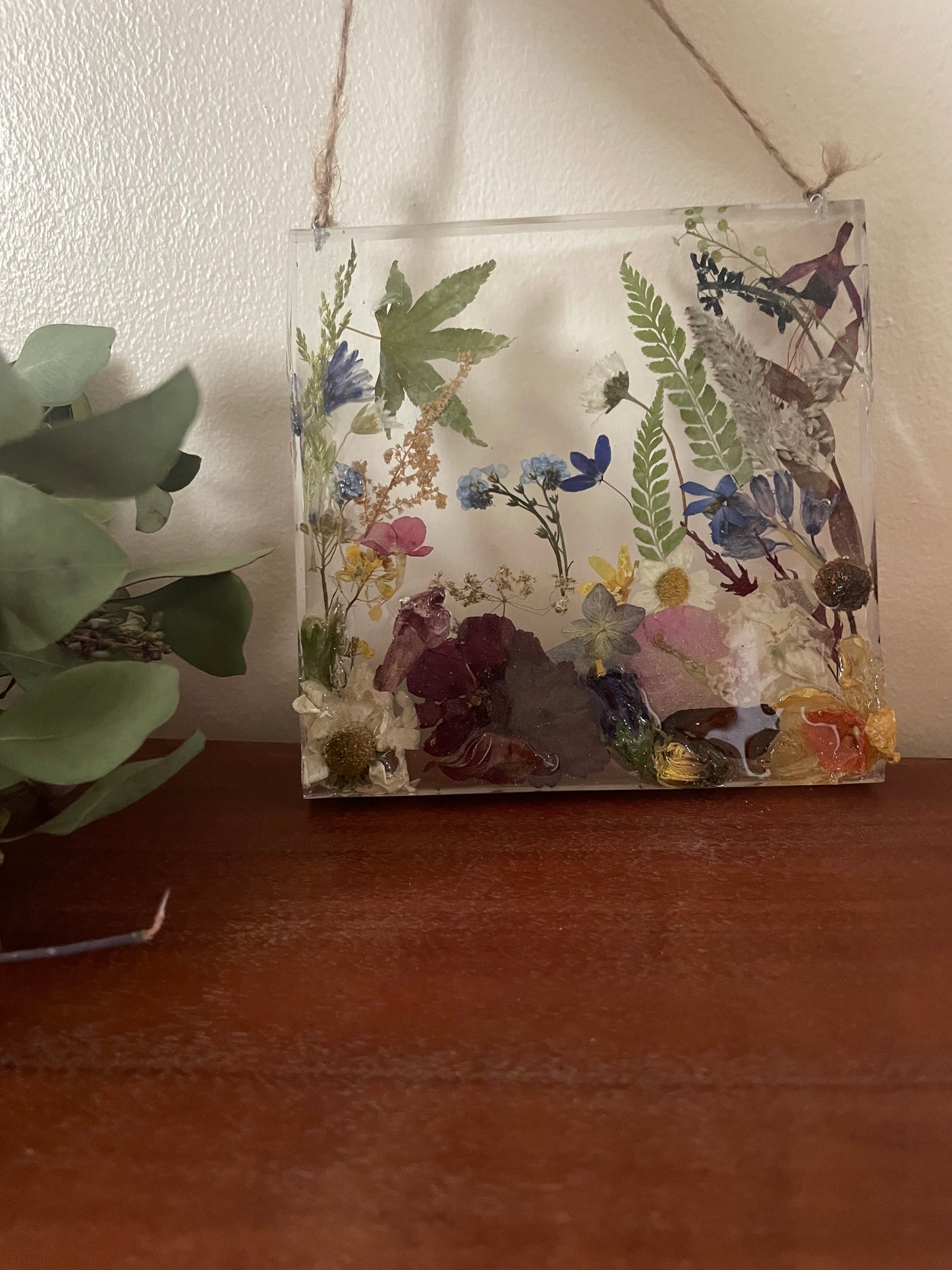 Dried flowers in resin wall art